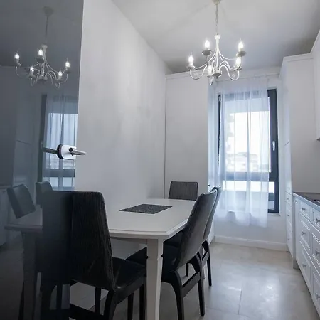 Cozynest Lakeside Апартаменты