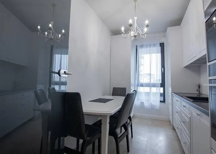 Cozynest Lakeside Апартаменты