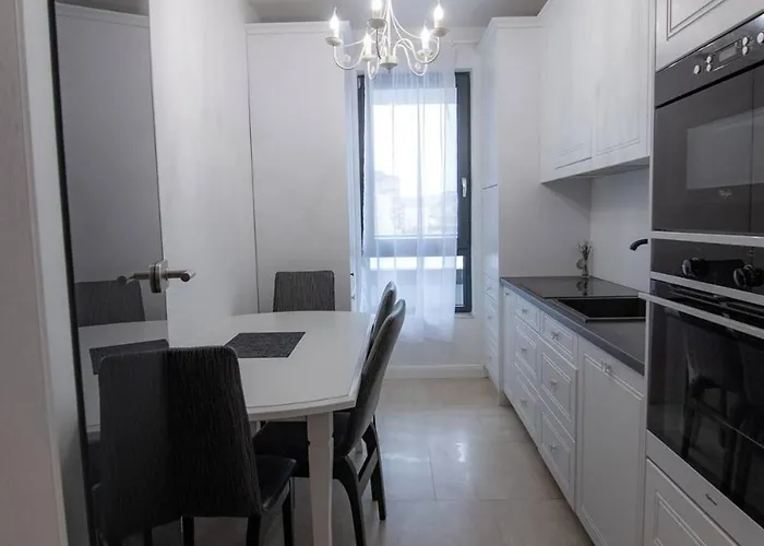 Cozynest Lakeside Апартаменты